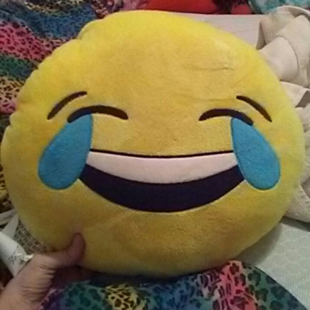 Plush laughing emoji.